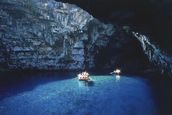 Greece, Kefallonia, visitors to the blue waters of the subterranean Melissani Cave-Lake