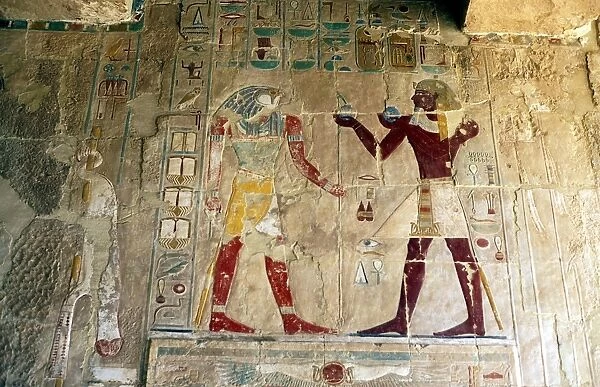 Hatshepsut (1540ja-1481jaBC) Queen of Egypt, presents offerings to the falcon-headed god Horus