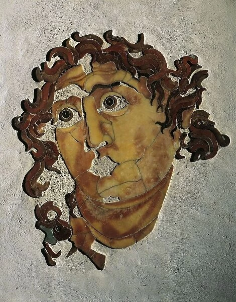 Head of Helios-Sol from a Hellenistic model of Alexander Helios from Italy, Rome, church of Santa Prisca, Mithraeum, opus sectile, 200-230 A. D