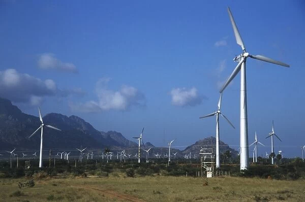 India, Tamil Nadu, wind turbines with the mountains of the Eastern Ghats in the background