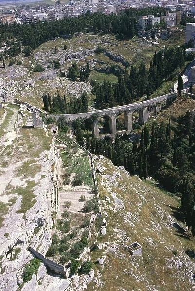 Italy, Apulia Region, Province of Bari, Aerial view of Roman aqueduct at Gravina in Puglia