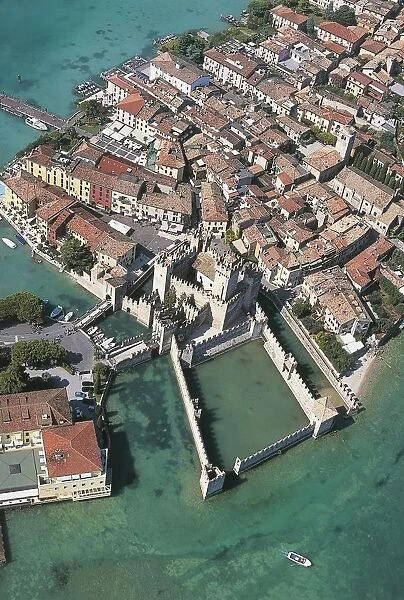 Italy, Lombardy Region, Province of Brescia, Aerial view of Scaligero Castle of Sirmione on Lake Garda or Benaco