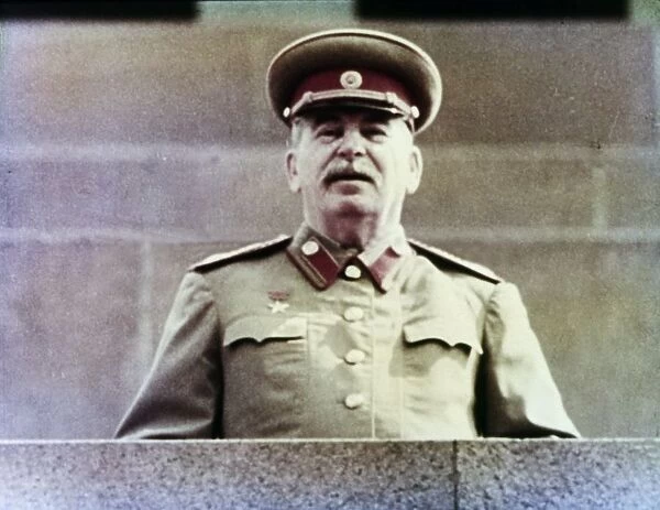 Joseph stalin watching the may day parade from lenins tomb in red square, moscow, ussr, 1952, (still from a news reel)
