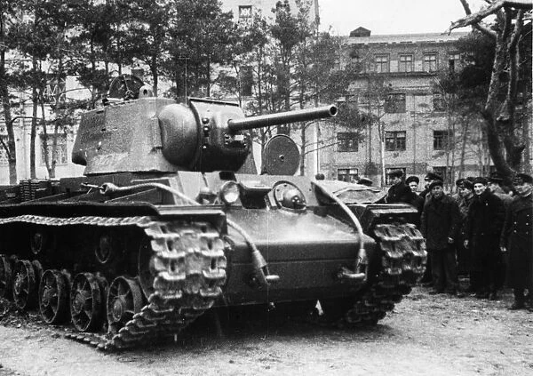 Kv-1 (klement voroshilov) tank, a group of civilians and red army men watch a new kv-1 tank that has just left the factory and will soon be on its way to the front, ussr, world war 2