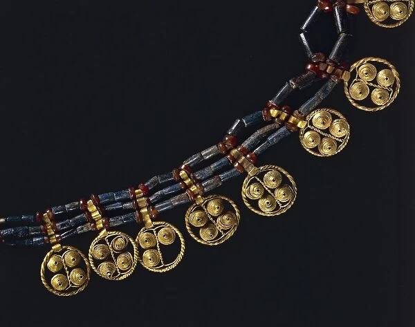 Lapislazuli and carnelian necklace with gold pendants, from Ur, Iraq