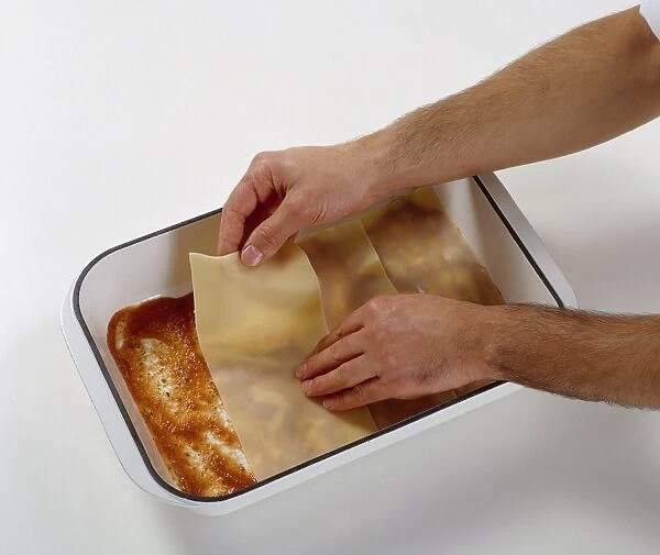 Layering lasagne in ovenproof dish