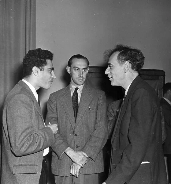 Lev landau, scientist, participants at scientific conference on high energy particles, left to right: prof, jack steinberger, columbia university (usa); prof, l, riddiford (uk); lev landau of ussr, moscow, may 1956