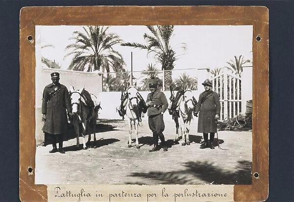 Libya, Italian Guardia di Finanza patrol with mules, leaving for survey, 1927