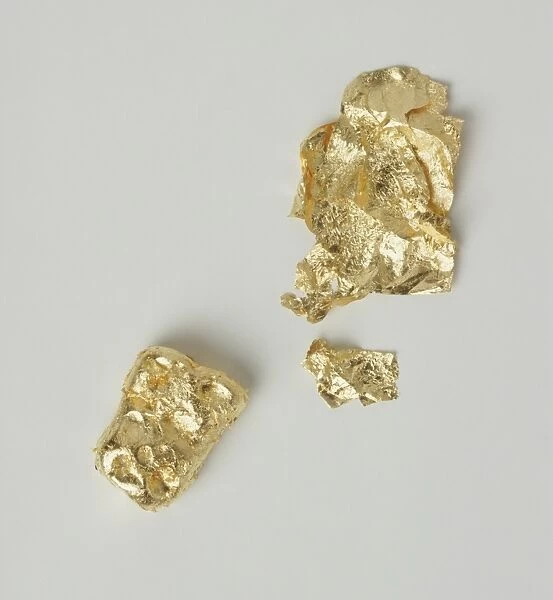 Three lumps of gold, close up