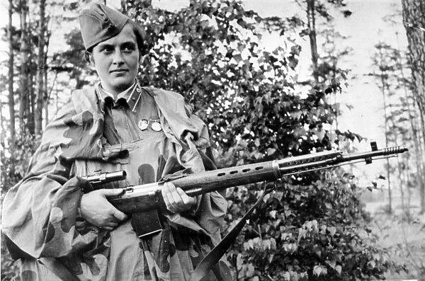 Lyudmila pavlichenko, famous 26 year old russian guerrilla sniper who has killed 309 germans, for which she was made a senior lieutenant and given the order of lenin, a former historian, she participated in the defense of odessa and of sevastopol where she remained until the last, she has been wounded four times