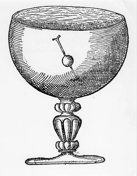 A magnetized needle pushed through a ball of cork, and floating submerged in a goblet of water