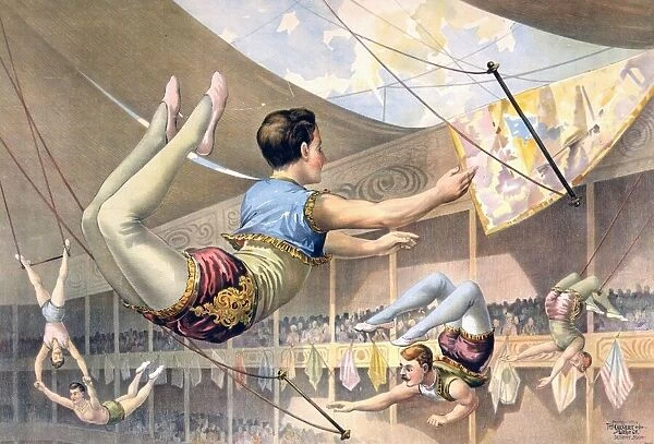 Five male trapeze artists performing at a circus c1890