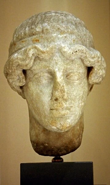 Marble head of young male figure with hairband