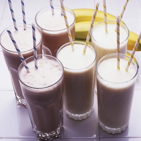 Six milkshakes served with two straws each