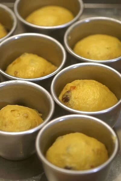 Mini panettones in moulds before baking