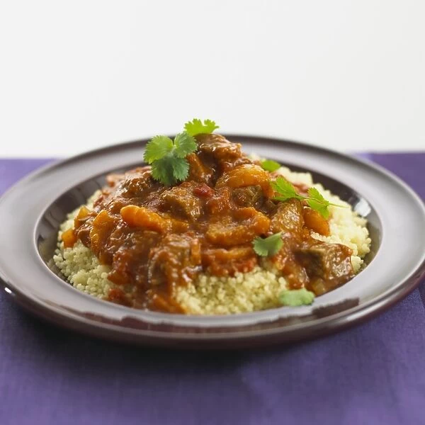 Moroccan lamb tagine with couscous, close-up