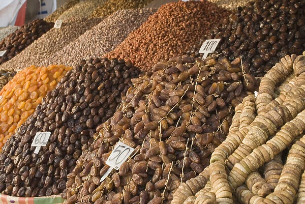 Morocco, Marrakech, Djemaa el Fna, dried fruits and nuts on display at market stall