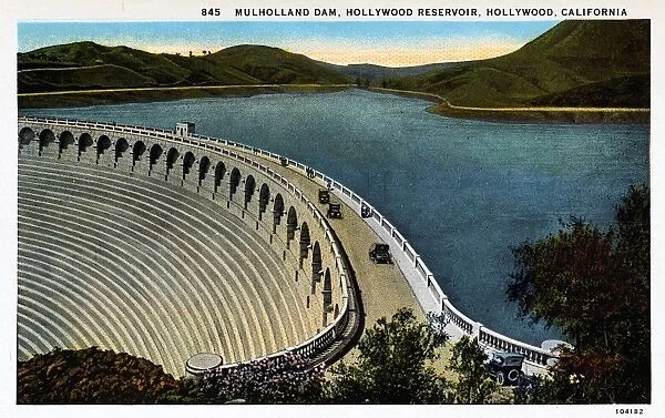 Mulholland Dam and Hollywood Reservoir. ca. 1925, Hollywood, Los Angeles, California, USA, MULHOLLAND DAM. HOLLYWOOD RESERVOIR. Capacity, 2, 500, 000, 000 gallons. Maximum depth of water, 183 feet