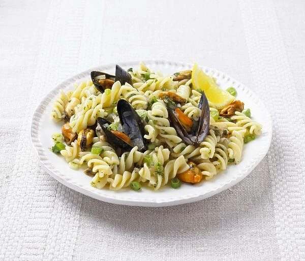 Mussel and fusilli pasta salad on a plate