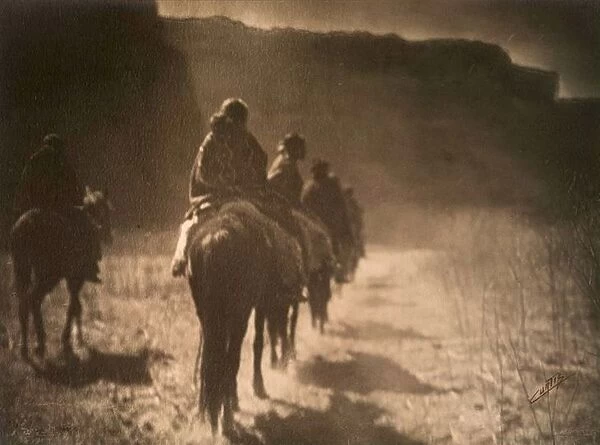 Native American Indians: The vanishing race: A group of mounted Navajo riding into the distance