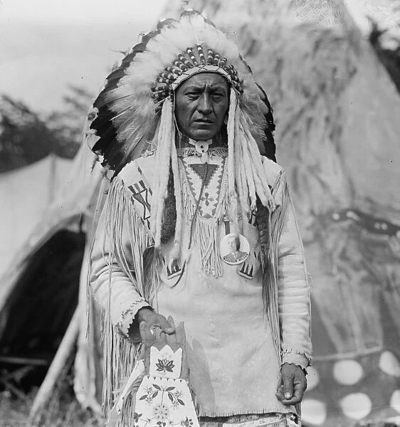 Native American in traditional clothing, 1923