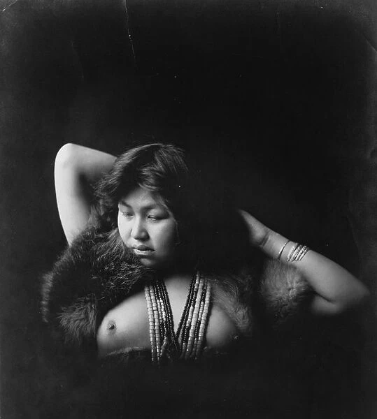 Native woman, nude, half-length portrait, facing slightly left