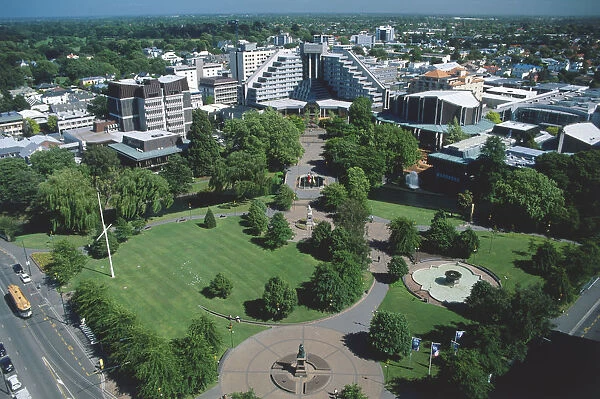 New Zealand, South Island, Christchurch, aerial view of Victoria Square with modern buildings in the background and a green park below