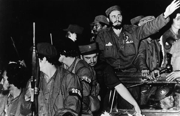 Newly victorious fidel castro ruz entering havana at the head of his revolutionary army, cuba, 1959, juan almeida bosque is behind him in profile