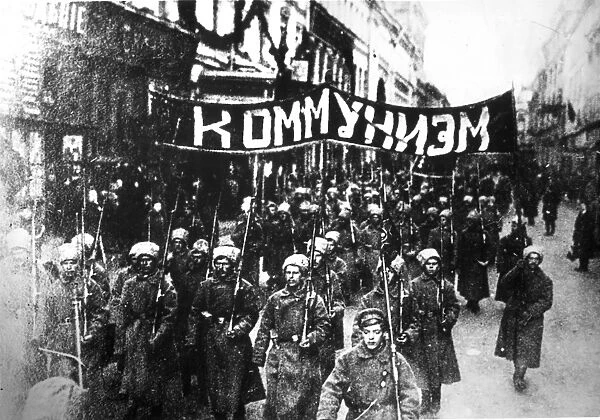 October revolution, a column of soldiers demonstrating along nikolsky street under the banner communism in moscow, 1917