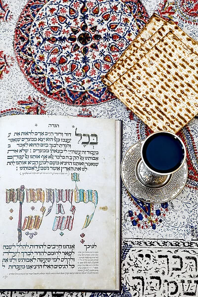 Passover Seder Haggadah in a Jerusalem jewish home, with wine and matsa