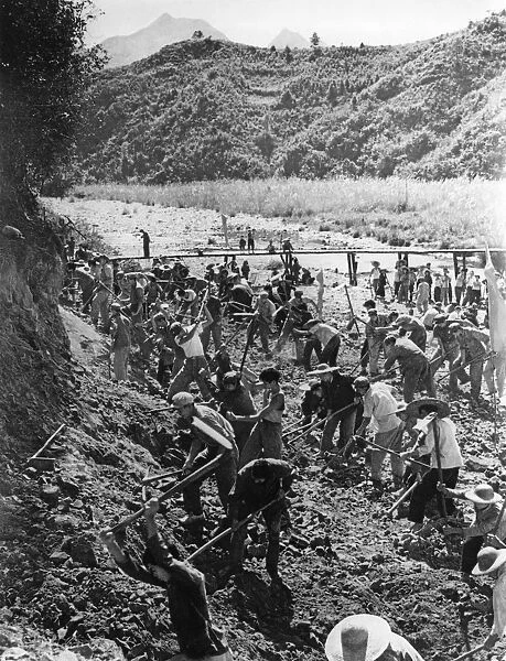 Peoples liberation army on a visit to the huangshantung brigade in kwangtung province work with commune members to dig a canal, november 1968, china, cultural revolution
