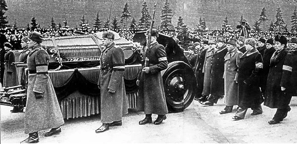 Personalities following the coffin of stalin as it is borne on a gun caisson through red square, moscow, march 9, 1953, right to left: premier zhou en-lai, premier g, m, malenkov, marshal k, voroshilov, l, kaganovich, marshall n, bulganin, v, m, molotov