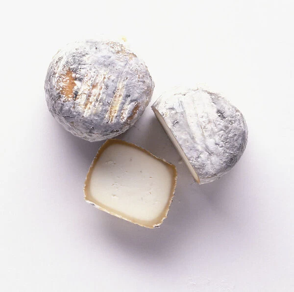 Three pieces of Crottin de Chavignol cheese