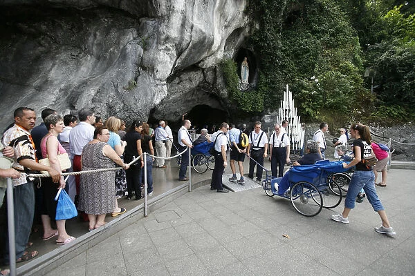 Pilgrims at the Lourdes grotto