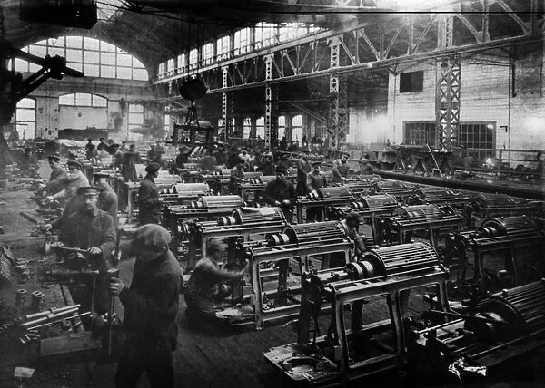 Pilot soviet-made semi-automatic textile machines are being assembled at the karl marx factory, leningrad, soviet union, 1924