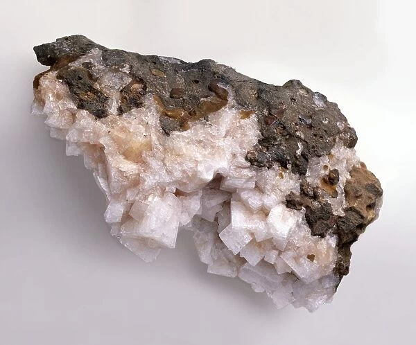 Pink-white chabazite crystals in basalt groundmass