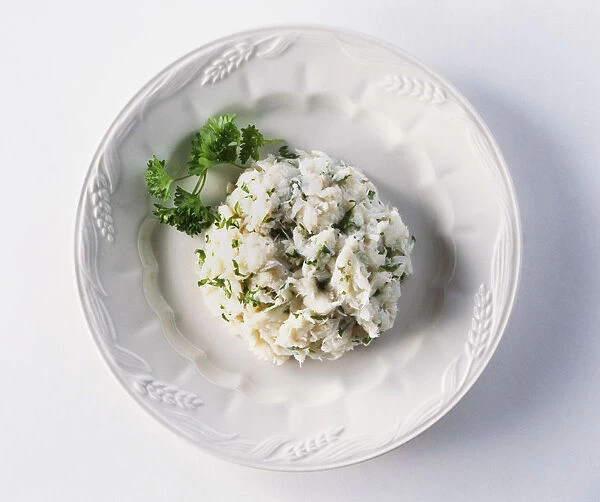 Plate of Baccala mantecata, a pureed, dried salted cod dish with parsley, from the Veneto, Italy, view from above