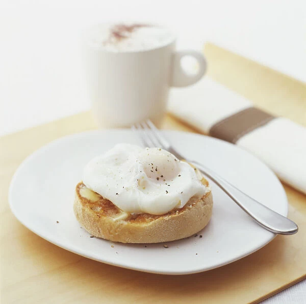 Poached egg served on toasted muffin