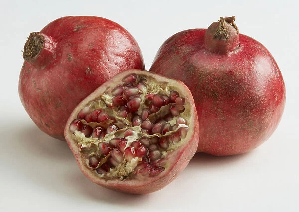 Pomegranate against white background