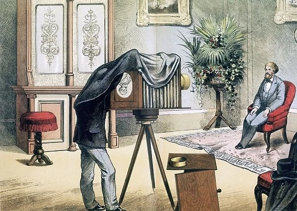 Portrait photographers studio with subject being photographed. Chromolithograph