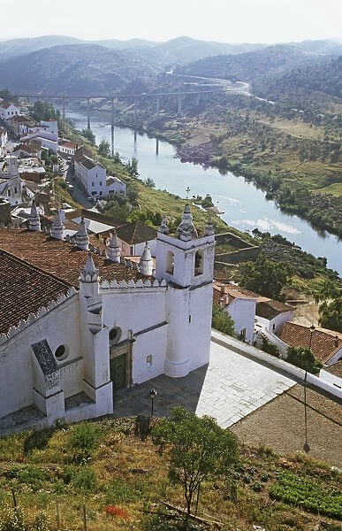Portugal, Mertola, view of Moorish-style church high above the Guadiana River