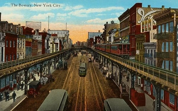 Postcard of the Bowery. ca. 1913, The Bowery, New York City. The Bowery, one of the most noted thoroughfares in the city, runs in a northeasterly direction through the most congested district of the famous East side. It practically begins at the Brooklyn Bridge under the name of Park Row and ends at Cooper Square. Was formerly a part of the old Boston Post Road