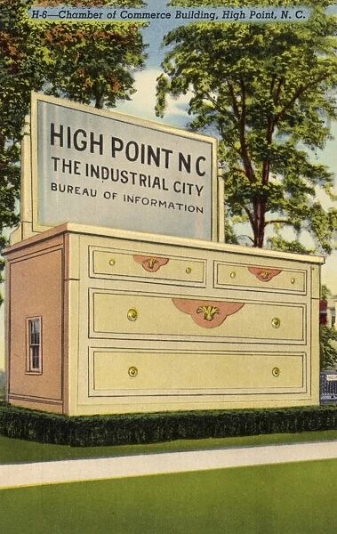 Postcard of the High Point Chamber of Commerce Building. ca. 1941, The Chamber of Commerce Building in High Point, North Carolina, which bills itself as the Home Furnishings Capitol of the World. The building, which doubled as the Worlds Largest Bureau, stood 32 feet high