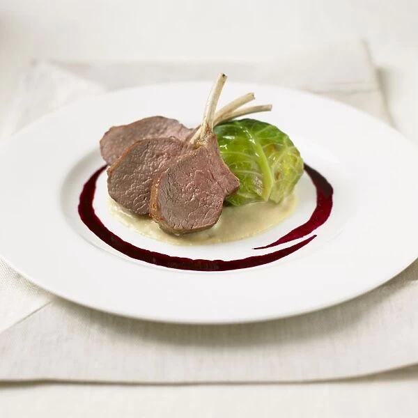 Rack of lamb served with cabbage parcel