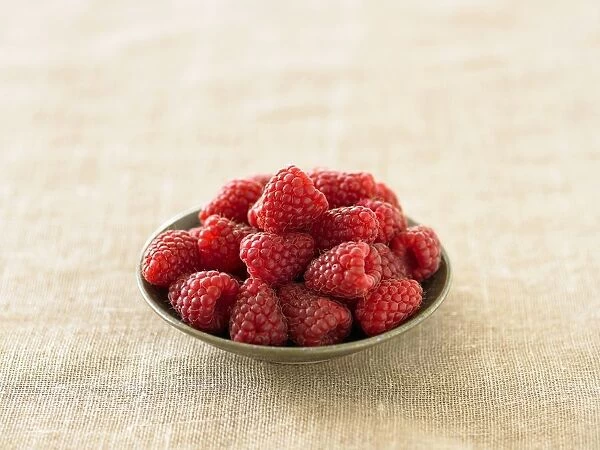 Raspberries in small bowl