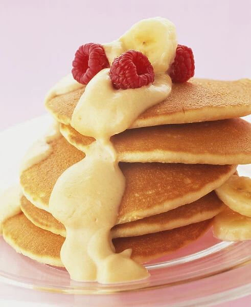 A rich and luxurious blend of bananas, fresh cream and caramel poured over a tower of hot pancakes