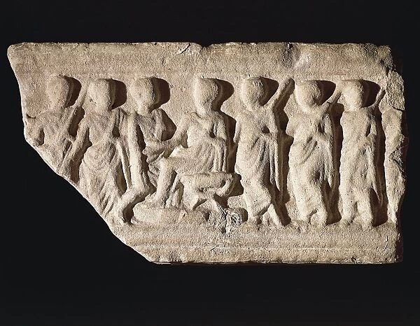 Roman civilization, relief portraying magistrate sitting on bisellium and surrounded by lictors and figures