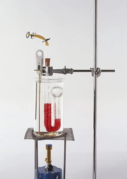 Scientific apparatus used in pressure experiment to show Charlies Law, the volume of a mass of gas at a fixed pressure depends on its temperature