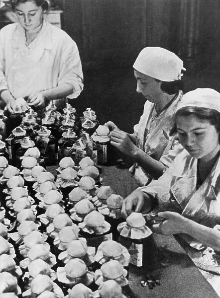 Sealing and labelling some of the thousands of flasks of blood donated by citizens of Moscow: 1941