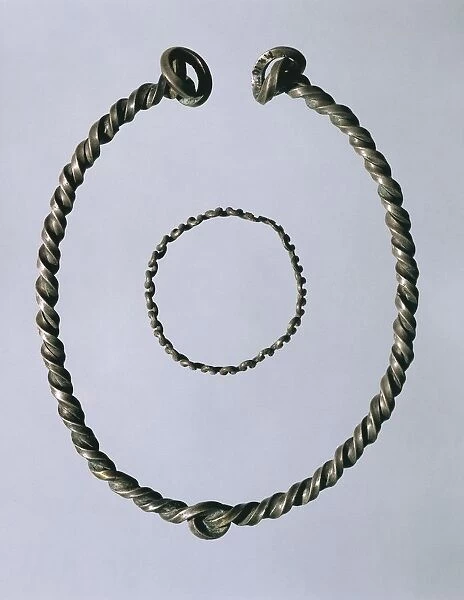 Silver torque or necklace and armilla (bracelet) from excavations of Carpenedolo, Brescia province, Italy